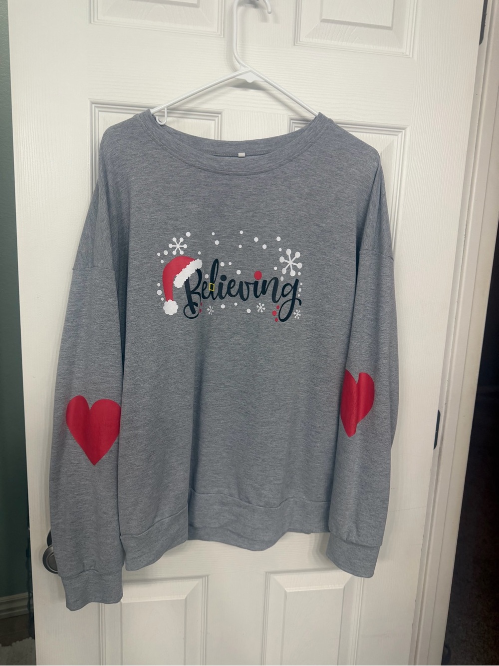 Believing Grey Holiday Sweatshirt with Red Heart Elbow Patches